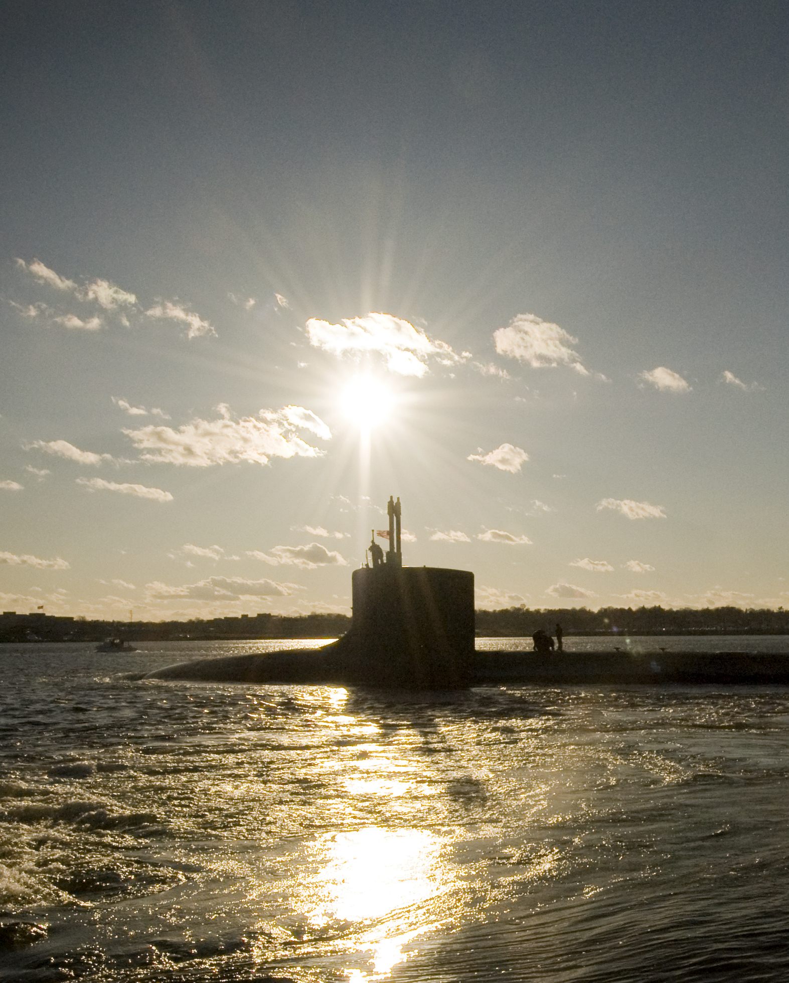 The Virginia-class attack submarine USS Virginia departing on a six-week deployment