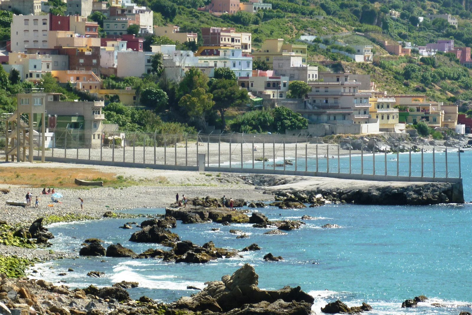 The high double border fence separating Ceuta, Spain from Morocco