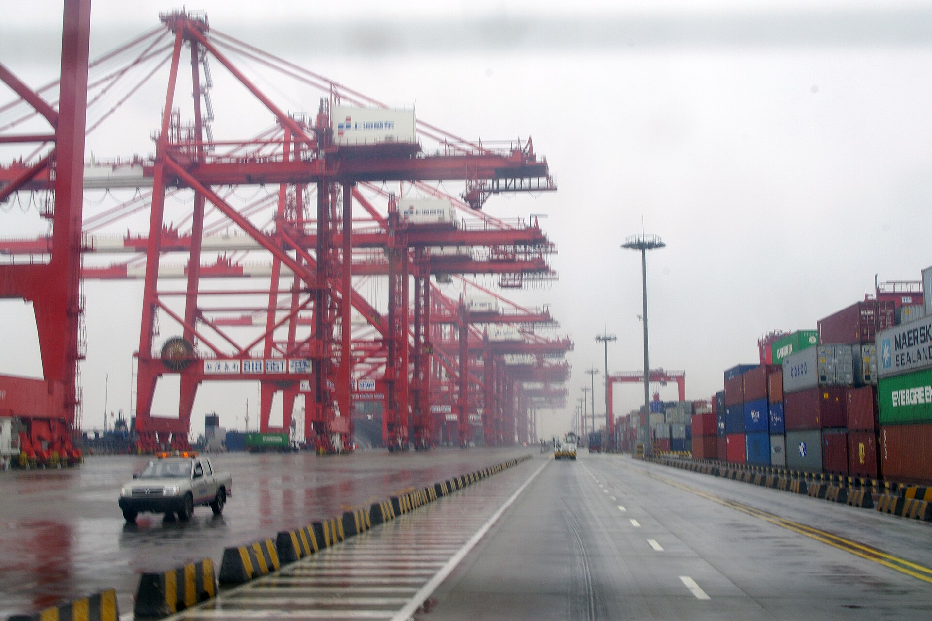 Container ships and gantry cranes at Yangshan Deep-Water Port near Shanghai
