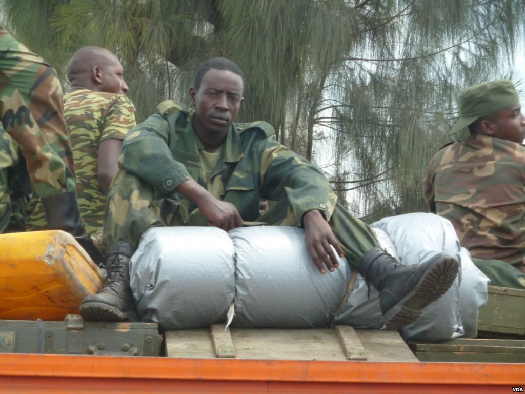 An M23 rebel soldier during the group's earlier withdrawal from Goma
