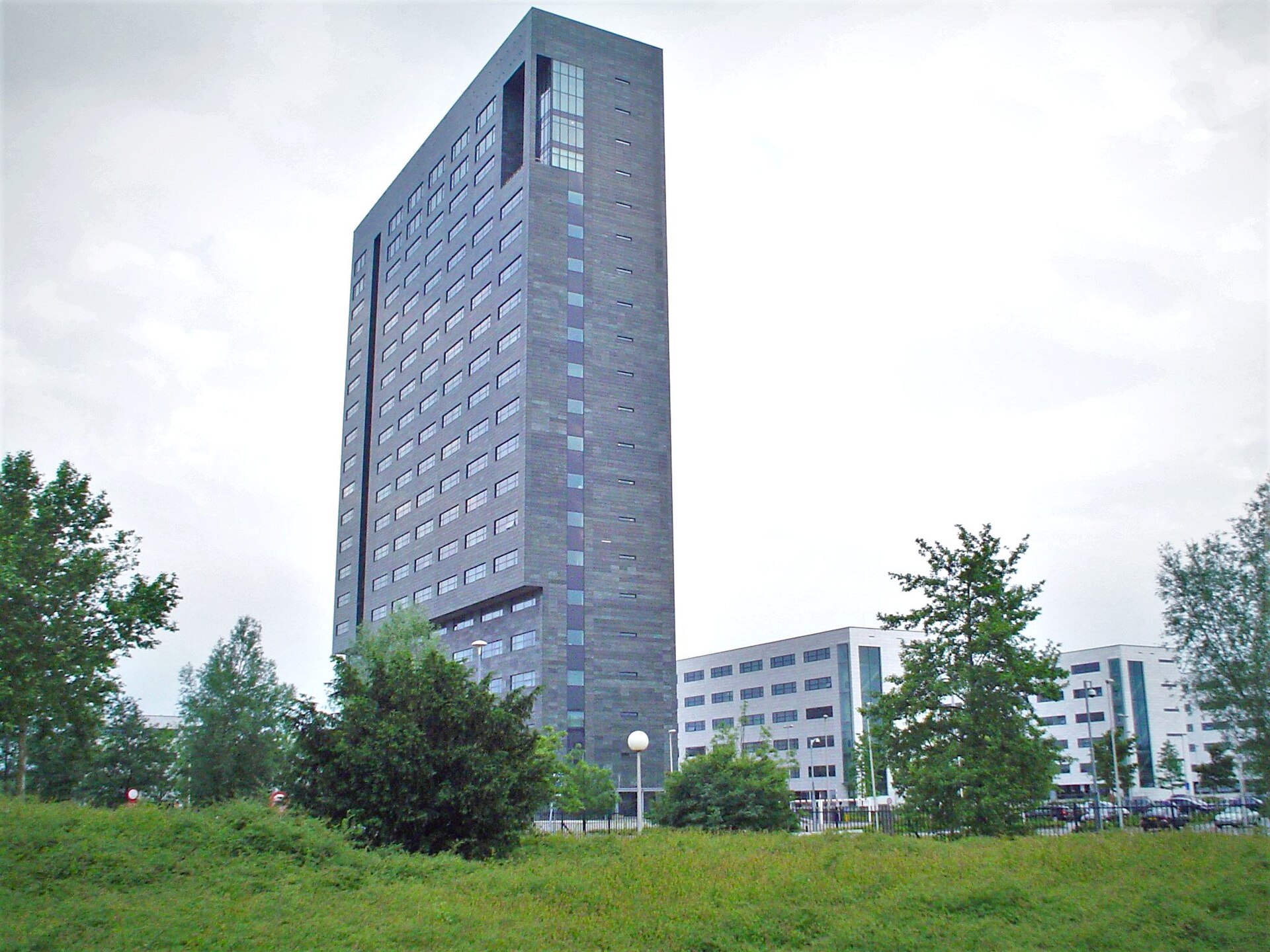 The modern glass-and-steel headquarters of ASML in Veldhoven, the Netherlands.
