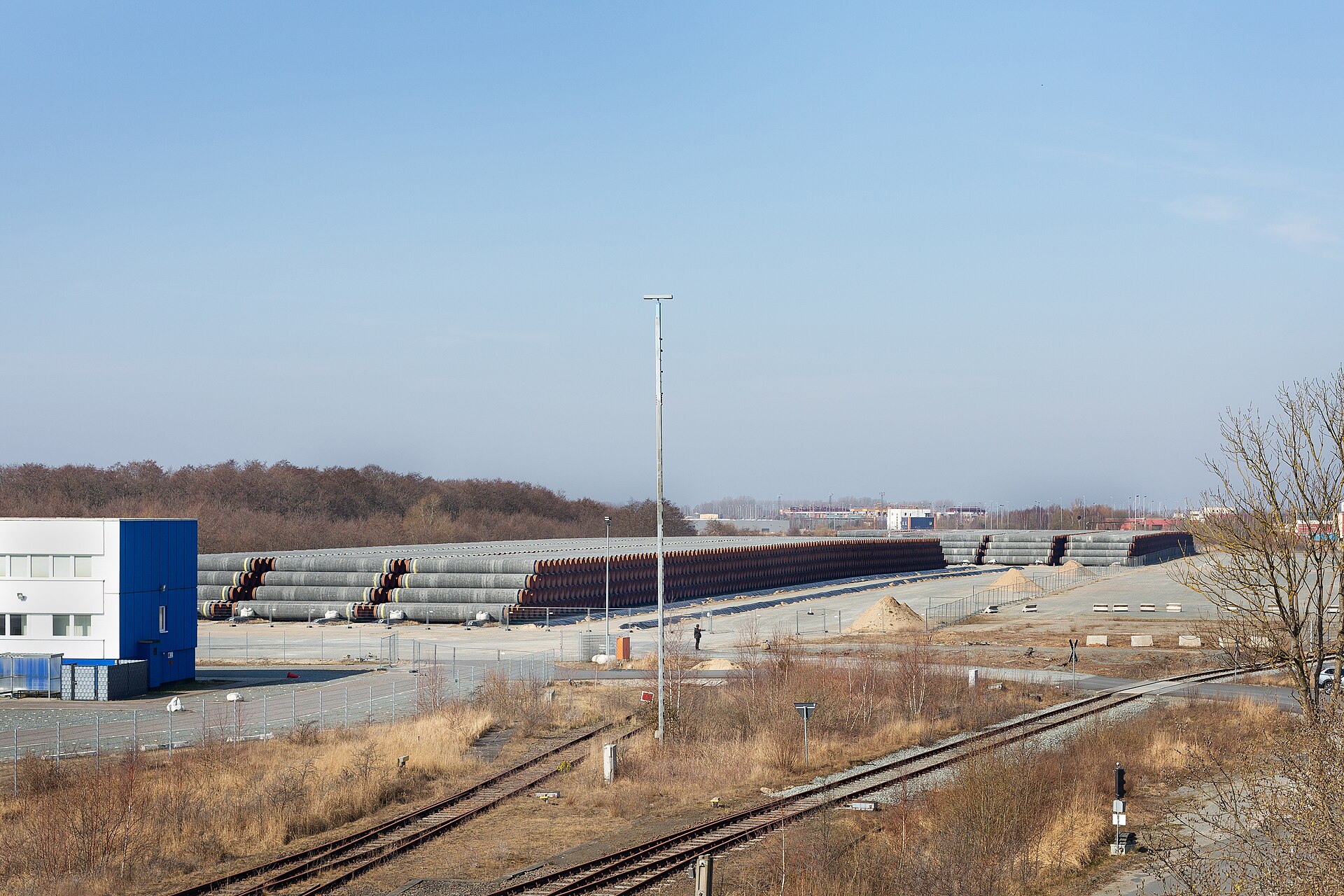 Thousands of concrete-coated steel pipes for the Nord Stream 2 gas pipeline stacked in rows at Mukran port on the German Baltic coast.