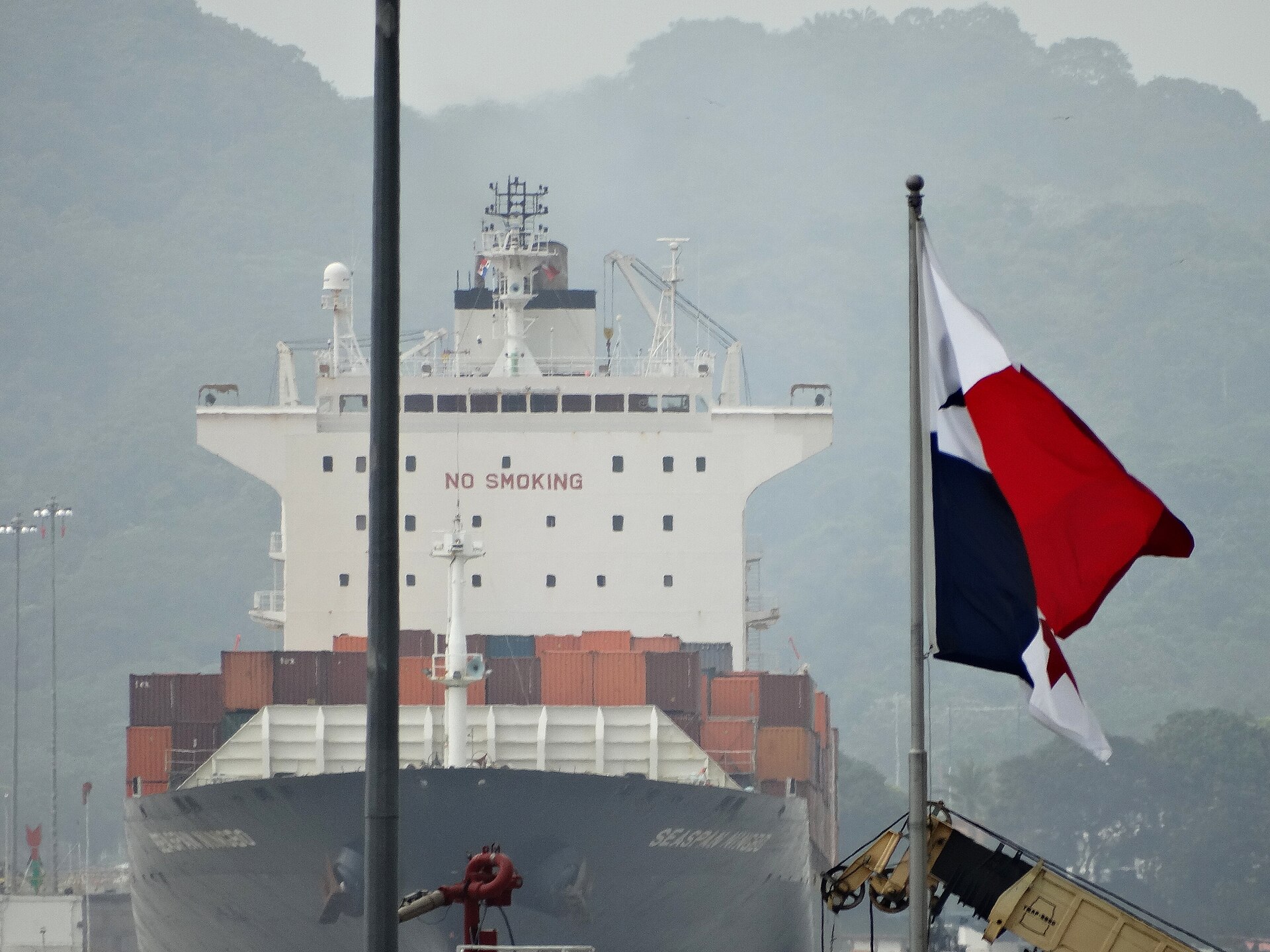 A container ship entering the Miraflores Locks on the Panama Canal