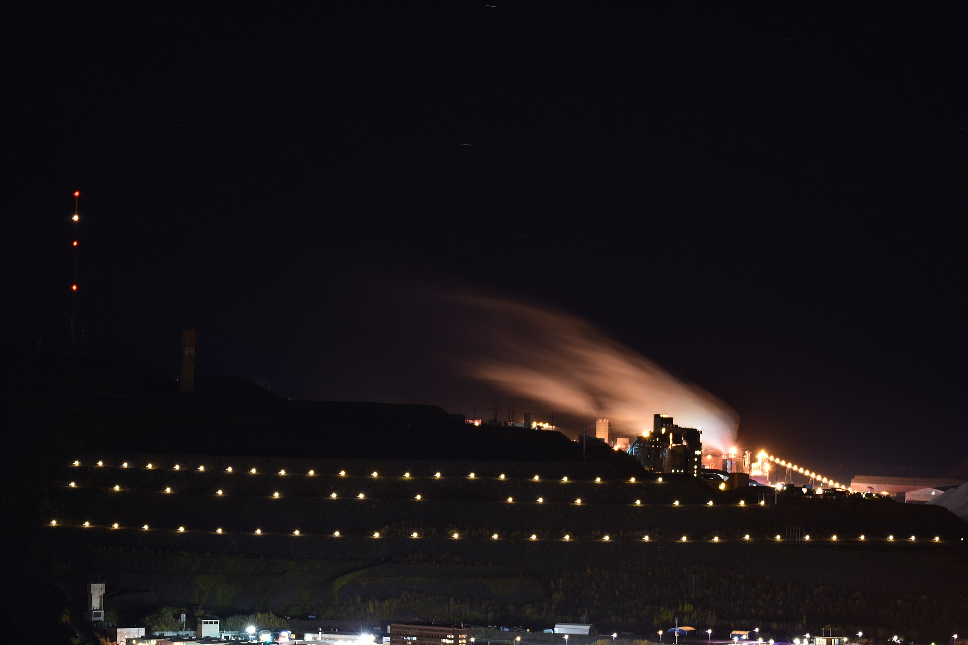 The LKAB iron-ore mine at Kiruna, northern Sweden, lit up against the autumn night sky