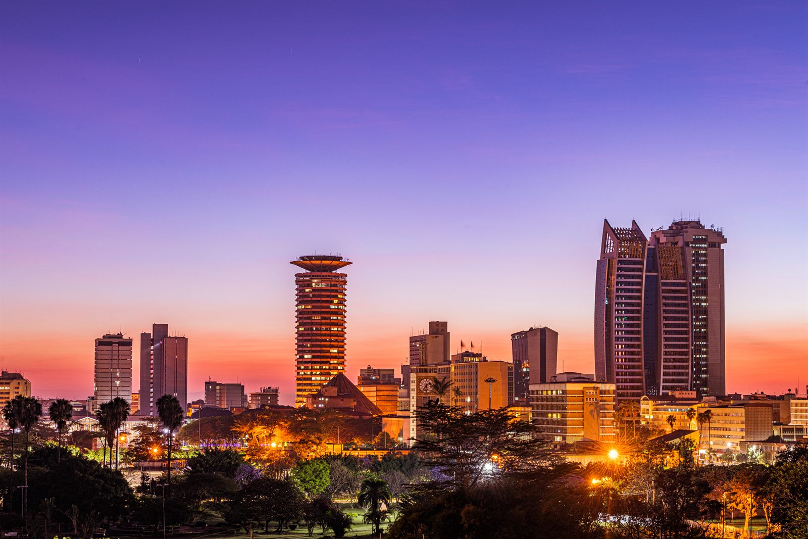 Antony Trivet / Wikimedia Commons · CC BY-SA 4.0 The high-rise skyline of Nairobi, Kenya, under a clear sky